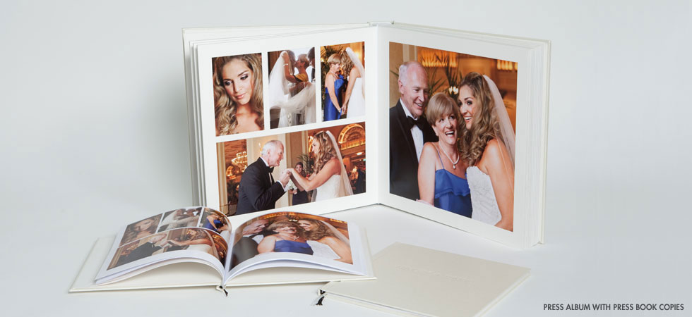 Queensberry Press Album open with Book copies
