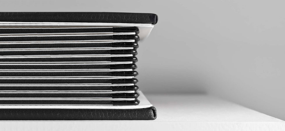 Queensberry matted album pages with black edging